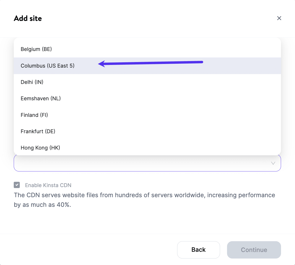 A screenshot of MyKinsta showing the "Add Site" location drop-down set to 